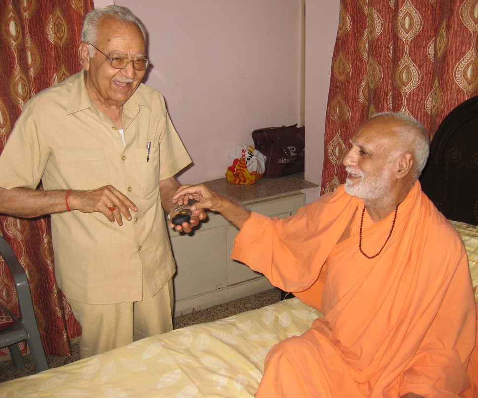 19th June. Evening. Saharanpur. The Shaligram in the hands of Jagdaman Ji was brought by Maharaj Ji from Damodar Kund years back and has since then been kept by Jagdaman Ji in their temple at home.